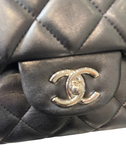 Chanel Black Calfskin Quilted Single Flap Maxi Classic Handbag.